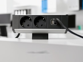 NETBOX Fusion Schuko with USB charger A+C in the office NETBOX Fusion desktop socket