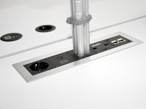 Super-flat built-in socket outlet with monitor holder and USB charger